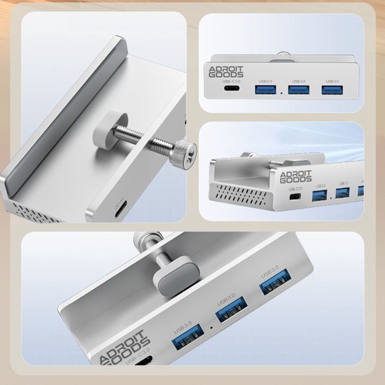 Dichtbij zicht op zilverkleurige USB-hub met drie poorten en bevestigingsklem van AdroitGoods