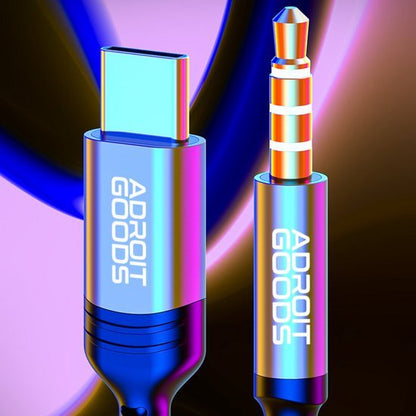 Close-up van een kleurrijke USB-C en 3,5mm audioadapter met AdroitGoods logo in gloeiende kleuren