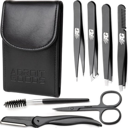 Zwart verzorgingsset met etui, pincetten, schaar en kam voor precisiewerk en styling.