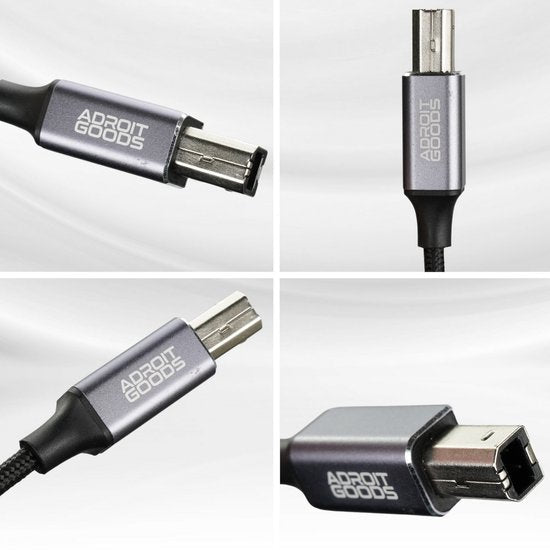 Close-up van een grijze connector met geweven kabel en zichtbare merknaam Adroit Goods